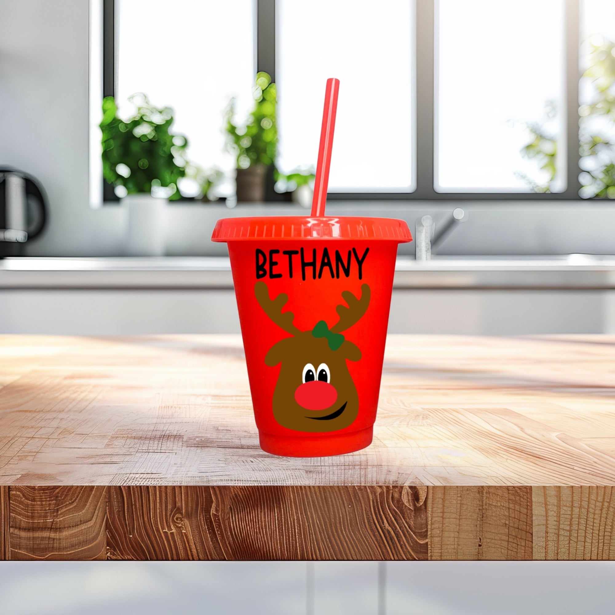 Red Christmas reindeer kids cup and straw personalized with custom name for toddlers.